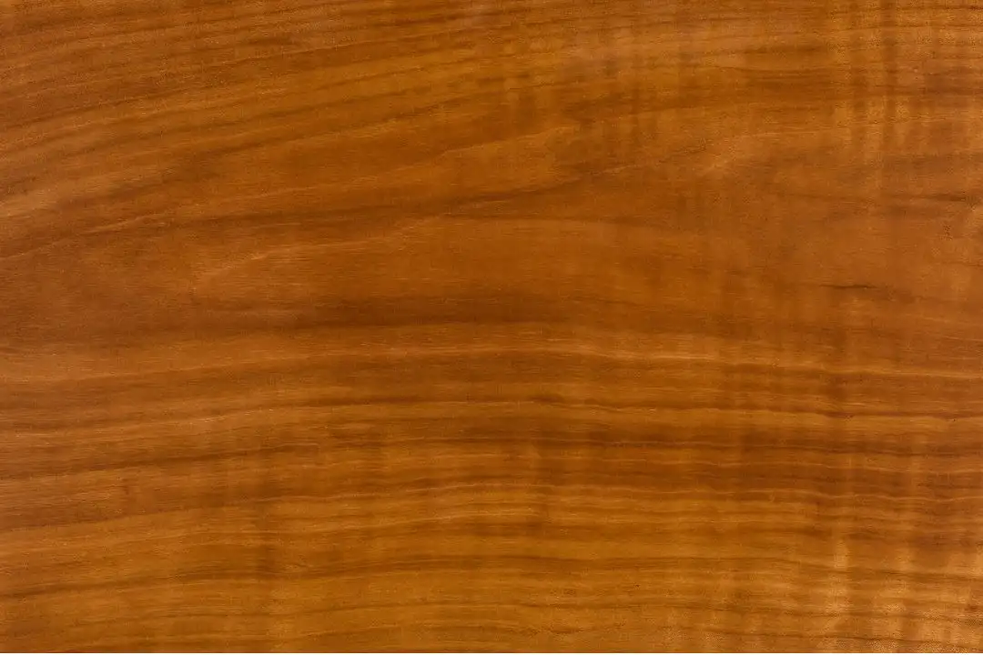 Cherry wood grain with warm reddish tone for furniture
