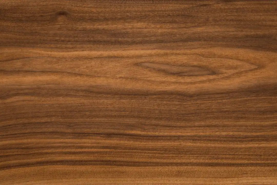 Walnut wood grain with dark brown color for furniture